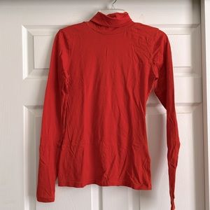 Orange turtleneck tee